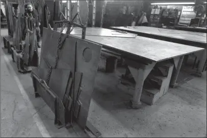  ?? The Associated Press ?? PRODUCTION FLOOR: In this photo taken Feb. 12, 2015, cut panels of steel used to make blades to build fans for industrial ventilatio­n systems are stored on the production floor in Harmony, Pa. President Donald Trump pledged during the campaign to help...