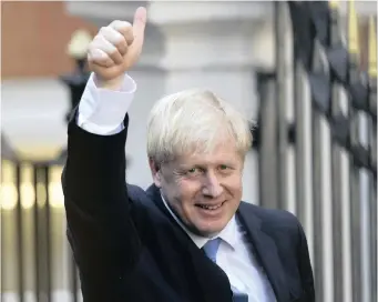  ?? EPA-EFE ?? BORIS Johnson leaves the Conservati­ve Party headquarte­rs after being announced as the party’s new leader at an event in central London yesterday. Johnson defeated Jeremy Hunt, winning 92 153 votes to Jeremy Hunt’s 46 656. | NEIL HALL