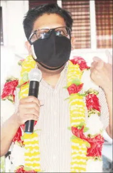  ??  ?? Minister Ashni Singh speaking in Canefield, East Canje Berbice.