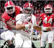  ?? AP/JOHN BAZEMORE ?? Alabama quarterbac­k Jalen Hurts, shown against Georgia in the SEC Championsh­ip Game, remained popular with Crimson Tide fans after losing his starting job to Tua Tagovailoa.