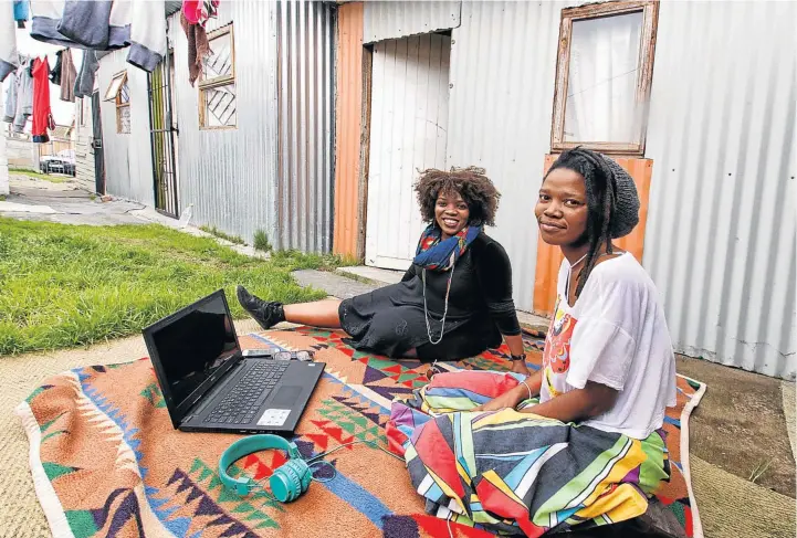  ??  ?? SOUL SISTERS: Jazz and blues singer Nhoza Sitsholwan­a, left, and ’femtastic’ rapper Kanyi Mavi, will be heard at home when they appear at the Gugulethu Festival