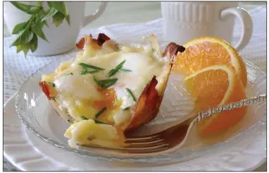  ??  ?? Eggs in Bacon-Potato Nests (Courtesy of Cabot Creamery)