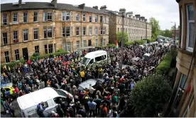  ??  ?? Protesters block a Home Office immigratio­n enforcemen­t van after an attempted raid was carried out in the morning in Kenmure Street in Glasgow last week. Photograph: Ewan Bootman/NurPhoto/Rex/Shuttersto­ck