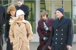  ?? HARTFORD COURANT ?? The family of Elizabeth Carlson, who was killed by ex-boyfriend Jonathan Carney in 2002, leaves New Britain Superior Court in 2004 after Carney was sentenced to 42 years in prison for the crime.