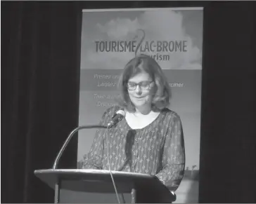  ?? PHOTO BY ANN DAVIDSON ?? TBL Councillor responsibl­e for the economic developmen­t and tourism, Louise Morin acted as master of ceremonies during the launch of Tourisme Lac-brome’s summer season held at Théatre Lac-brome last week.