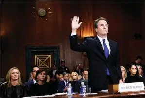  ?? AP/ANDREW HARNIK ?? Supreme Court nominee Brett Kavanaugh and his accuser, Christine Blasey Ford, are sworn in Thursday at different times to testify before the Senate Judiciary Committee. Kavanaugh decried the hearing as “a circus.” Ford said she was terrified but wanted to do “my civic duty” to recount what she said was a sexual assault by Kavanaugh in 1982.