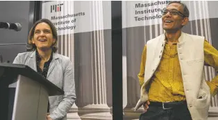  ?? MICHAEL DWYER/ASSOCIATED PRESS ?? Esther Duflo, left, and Abhijit Banerjee speak during a news conference at Massachuse­tts Institute of Technology in Cambridge on Monday. Banerjee and Duflo, along with Harvard’s Michael Kremer, were awarded the 2019 Nobel Prize in economics for pioneering new ways to alleviate global poverty.