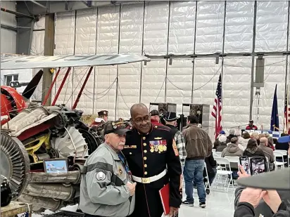  ?? PHOTOS BY KIMBERLY K. FU — THE REPORTER ?? Army veteran Nick Sanza, left, poses with retired Sergeant Major Jesse Branch of the Marine Corps, who was a speaker at an event sponsored by the Rowland Freedom Center honoring Black soldiers from the Civil War to today.