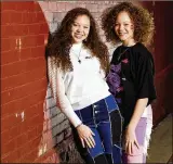  ?? NICK GRAHAM / STAFF ?? The Cunningham sisters, Macie, 15, left, and Marie, 13, have been singing on social media trying to spread a positive message and recently sent an audition video to the television show The Voice.