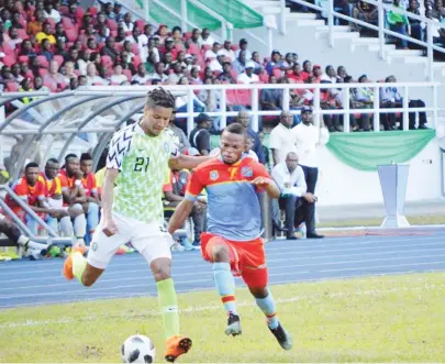  ?? Photo: NAN ?? Super Eagles defender, Tyronne Ebuehi tries to dribble past a DR Congo’s player (right), during an internatio­nal friendly game in Port Harcourt, Rivers State yesterday