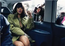  ??  ?? Rihanna … En route to Balmain show, Paris, 2014. Photograph: Dennis Leupold