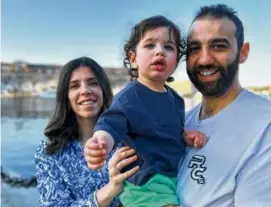  ?? ?? Wafaa Abuzayda (left), 1-year-old Yousef Okal, and Abood Okal have been sheltering in Rafah for two weeks.