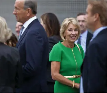  ?? CORY MORSE — THE GRAND RAPIDS PRESS VIA AP ?? U.S. Education Secretary Betsy DeVos arrives at the dedication ceremony of Michigan State University’s new Grand Rapids Medical Research Center on Wednesday in Grand Rapids, Mich.