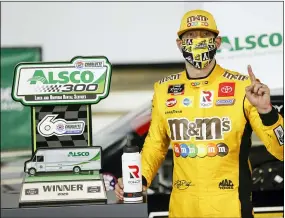  ?? GERRY BROOME — THE ASSOCIATED PRESS ?? Kyle Busch celebrates after winning the NASCAR Xfinity Series race at Charlotte Motor Speedway on May 25 in Concord, N.C.