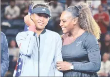  ??  ?? US Open Womens Single champion Naomi Osaka (left) of Japan with Serena Williams at the 2018 US Open at the USTA Billie Jean King National Tennis Center in New York in this September 8, 2018 file photo. — AFP photo