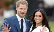 ??  ?? UK’s Prince Harry with fiancee Meghan Markle