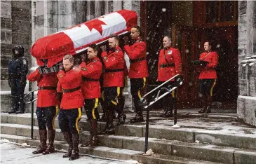  ?? Peter McCabe/Canadian Press via Associated Press ?? The casket carrying the former prime minister Brian Mulroney is taken from St. Patrick’s Basilica on its way to Notre Dame Cathedral in Montreal on Saturday.