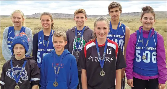  ?? SUBMITTED PHOTO ?? The SWAC cross-country championsh­ip was held at Grasslands National Park on Sept. 29. Pictured are age group champions: back row - Midget Girls, Hillary Lacelle (SCCHS); Junior Girls, Kea Frase (SCCHS); Junior Boys, Rhys Oneill (Ponteix); Senior Boys, Rueben Kuzma (SCCHS); Senior Girls; Jenna St Jaques (SCCHS). Front row - Peewee Boys, Shane Cornelson (Ecole Centennial); Bantam Boys, Kaleb Mcburney (All Saints); Bantam Girls, Brogan Carlson (Stewart Valley). Missing: Pee Wee Girls, Addison Allen (Ecole Centennial); and Midget Boys, Elijah Nichola (Vanguard).