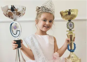  ??  ?? Quinn Lux Lownie with some of her trophies.