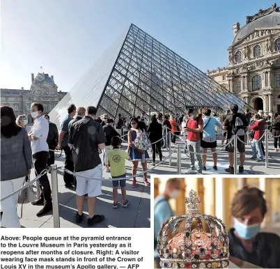  ??  ?? Above: People queue at the pyramid entrance to the Louvre Museum in Paris yesterday as it reopens after months of closure. Right: A visitor wearing face mask stands in front of the Crown of Louis XV in the museum’s Apollo gallery. — AFP