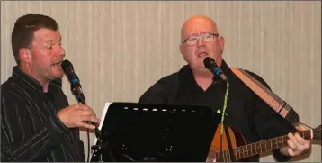  ??  ?? Jim Redmond and Mick Kavanagh perform a song composed on the topic of mental health.