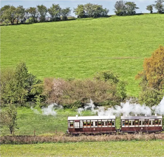  ?? ROBERT FALCONER ?? ABOVE What might rank as Stanegate Restoratio­ns and Replicas’ finest achievemen­t to date: the Knotty Trust’s three-coach North Staffordsh­ire Railway train, hauled by visiting Hawthorn Leslie 0-4-0ST Keighley Corporatio­n Gas Department No. 2 on May 4 2019.