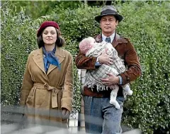  ??  ?? Even Marion Cotillard’s extraordin­ary charm is no match for Brad Pitt’s unconvinci­ng acting in Allied.