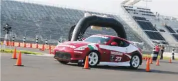  ?? / MARIO CAÑAS ?? Adrenalina a flor de piel. El 370Z fue el encargado de exponer las virtudes y defectos al volante de los participan­tes en el Autódromo Hermanos Rodríguez.