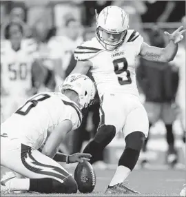  ?? Jack Dempsey Associated Press ?? CHARGERS ROOKIE Younghoe Koo’s bid for a tying field goal Sept. 11 in Denver was blocked. Six days later he missed a potential game-winner against Miami.