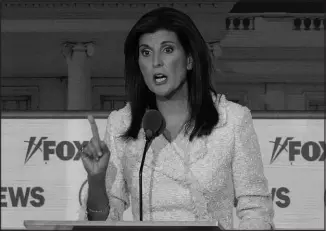  ?? MORRY GASH / ASSOCIATED PRESS ?? Former U.N. Ambassador Nikki Haley speaks during the Republican presidenti­al primary debate Wednesday in Milwaukee.