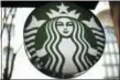  ?? GENE J. PUSKAR — THE ASSOCIATED PRESS FILE ?? Starbucks is getting rid of plastic straws at its locations around the world. The coffee company said Monday that it’ll offer a strawless lid or straws made of paper or compostabl­e material instead.