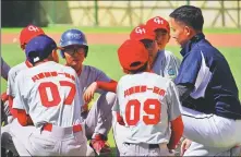  ?? GENG HUIHUANG / XINHUA ?? Above right: Pupils listen attentivel­y to their coach during a training session.