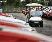  ?? Mark Mulligan / Houston Chronicle file ?? Customers are driven through rows of vehicles at Sterling McCall Toyota on the Southwest Freeway. It’s a Group 1 Automotive dealership.