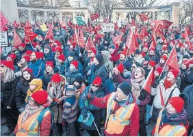  ?? RYAN REMIORZ THE CANADIAN PRESS FILE PHOTO ?? Striking teachers march in Montreal in December. Statistics Canada found that the educationa­l services sector gained six per cent in January, after falling in November and December due to the strikes in Quebec.