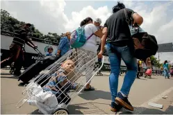  ?? PHOTO: AP ?? Venezuelan citizens arrive to La Parada neighbourh­ood of Cucuta, Colombia, on the border with Venezuela. Aside from providing health care, border cities are also coping with an array of public safety issues, like a rise in prostituti­on and groups of...