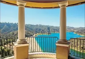  ??  ?? BELOW THE 25,680-square-foot mansion is the reservoir. Among the amenities are two terrace patios with fire pits.