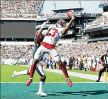  ?? JOHN BLAINE — FOR THE TRENTONIAN ?? Giants receiver Odell Beckham Jr. (13) leaps to haul in a touchdown pass over Eagles defensive back Jalen Mills (31) during the fourth quarter of last Sunday’s game at Lincoln Financial Field.