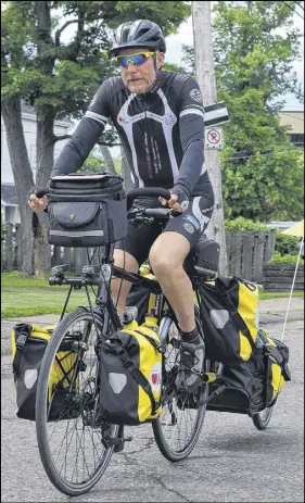  ?? FRAM DINSHAW/TRURO DAILY NEWS ?? Gordon Paterson cycled through Truro recently on his bike trip in support of the Heart and Stroke Foundation. His Canadian trek will take him from Halifax to Vancouver.