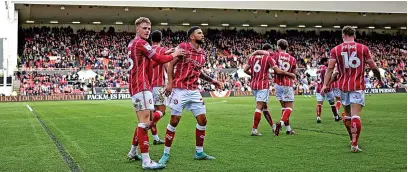  ?? Picture: Ashley Crowden/JMP ?? Tommy Conway, left, celebrates with Nahki Wells after scoring against Reading