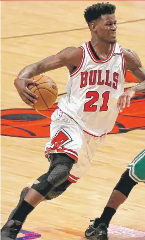  ?? | CHARLES REX ARBOGAST/ AP ?? Three- time All- Star Jimmy Butler, who averaged 23.9 points in 2016- 17, will be reunited with former Bulls coach Tom Thibodeau in Minnesota.