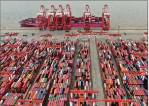  ?? (AP) ?? The Yangshan container port is seen in an aerial view in Shanghai, China, in this July file photo. China has applied to join an 11-nation Asia-Pacific free trade group in an effort to increase its influence over internatio­nal policies.