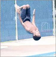  ?? Photo by Mike Eckels ?? Devon Bartlett of Decatur does a back flip off the diving board at Decatur city pool June 2.