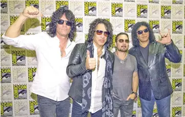  ?? — Reuters file photo ?? Rock band Kiss (from left-right) Tommy Thayer, Paul Stanley, Eric Singer and Gene Simmons pose at a press line for “Scooby-Doo! and Kiss: Rock and Roll Mystery” during the 2015 Comic-Con Internatio­nal Convention in San Diego, California July 9, 2015.