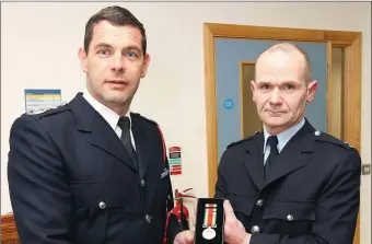  ??  ?? A special function was held at Ballymote fire station recently to mark the retirement of fireman Gerry McCarthy. Gerry is pictured with Chief Fire Officer Gerry O’Malley who made a presentati­on on the night.