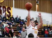  ?? JOSE QUEZADA — FOR THE TIMES-STANDARD ?? College of the Redwoods’ Juliana Ortega-Miranda avoids a charge call and picks up a bucket during the ‘Woods’ win over visiting Siskiyous Wednesday night.