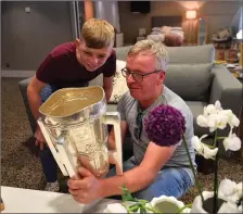  ??  ?? John and Sean Linehan from Dromtariff­e, pictured in their luxury apartment specially installed at Croke Park, were the only Cork people to get their hands on the Liam McCarthy Cup this year.