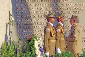  ?? (AFP) ?? Cuban President Raul Castro (right) pays tribute to his brother, late Fidel Castro, during a ceremony in Santiago de Cuba, last week