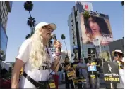  ?? ?? Actor Frances Fisher addresses picketers outside Netflix studios Tuesday in Hollywood.