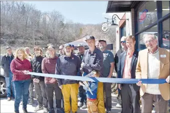  ?? Rachel Dickerson/The Weekly Vista ?? Phat Tire Bike Shop held its grand opening and ribbon cutting for its new location on Riordan Road on Saturday, March 18.