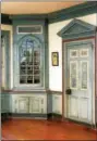  ?? SUBMITTED PHOTO ?? The marbleized paintdecor­ated Corner cupboard and pedimented doorway of the 1783 Hottenstei­n second floor chamber room is now installed at Winterthur Museum in their Fraktur room. Note the Bieber carved wall of Troy molding at the base of the corner...